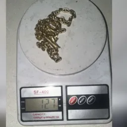 Ação do ouro